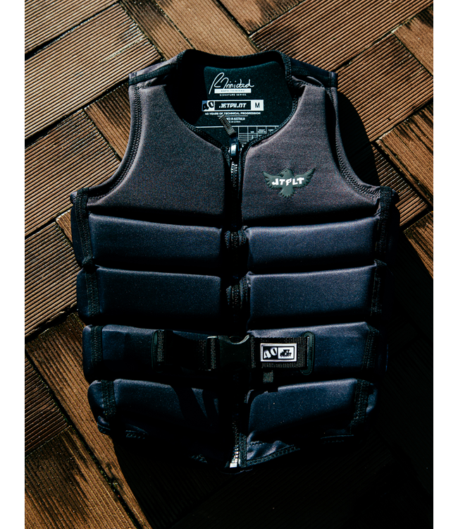 Jetpilot Raph X1 Black Mens Life Vest worn lifestyle shot of rider in athletic wakeboard pose