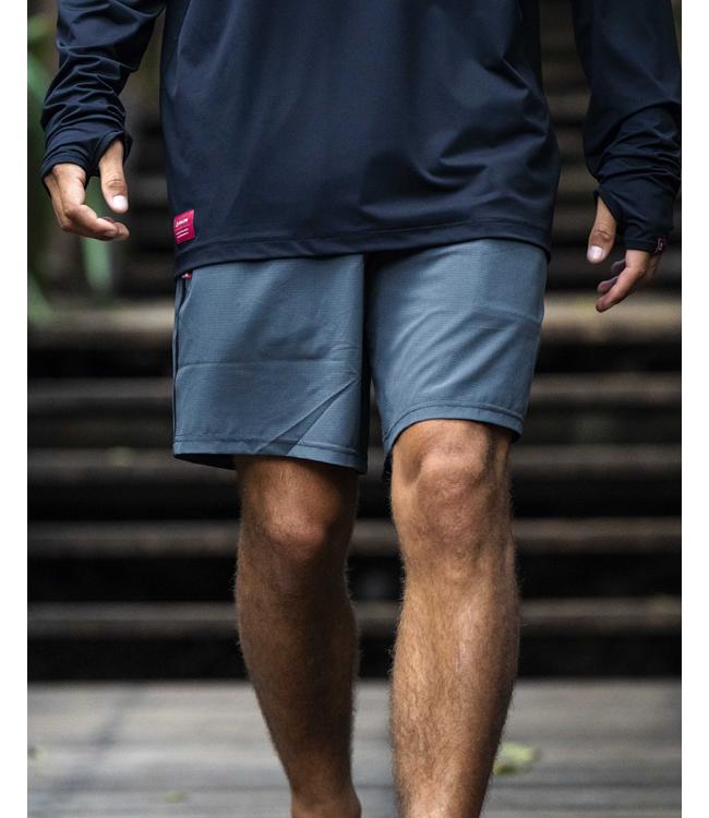 Follow Tech Shorts Stone Mens worn on the water during a full ride day behind the boat