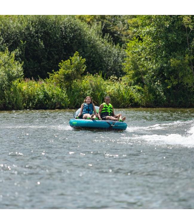 Jobe Compound 2-person ski tube - action shot of tube being towed across open water