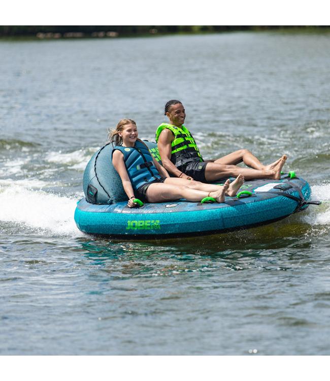 Jobe Compound 2-person ski tube - action shot of two riders riding behind a boat