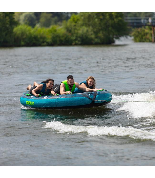 Jobe Compound 3-person ski tube - action shot of tube being towed across open water