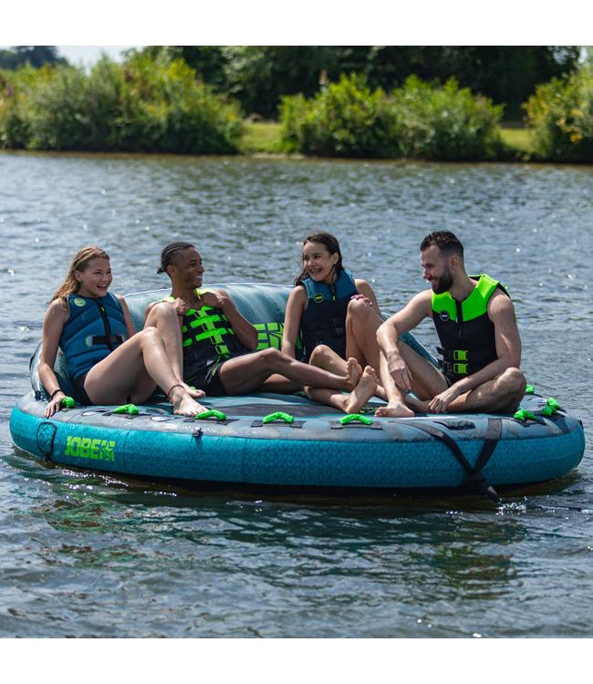 Jobe Compound 4-person ski tube - action shot of four riders leaning into a turn