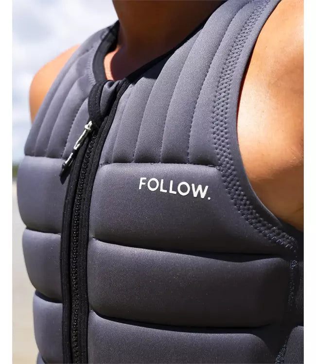 Follow Total Grey Mens Life Vest on a rider carving across the wake on flat water