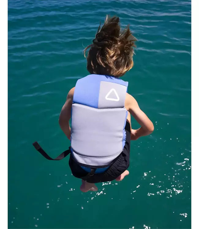 Follow Corp Junior Light Blue Life Vest on a child enjoying a day on the lake behind the boat