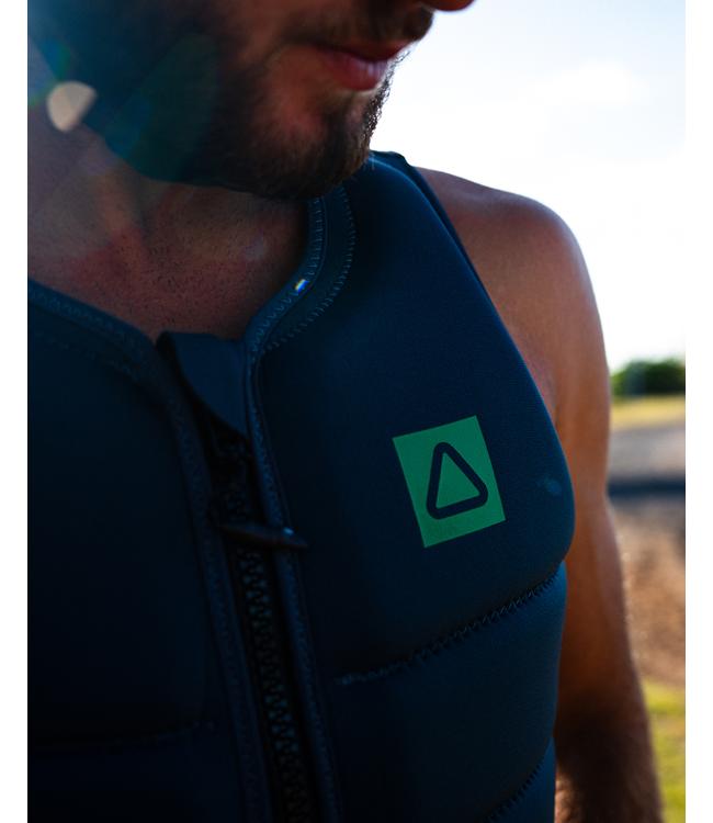 Follow Corp Black/Green Mens Life Vest on a rider carving across the wake on open water