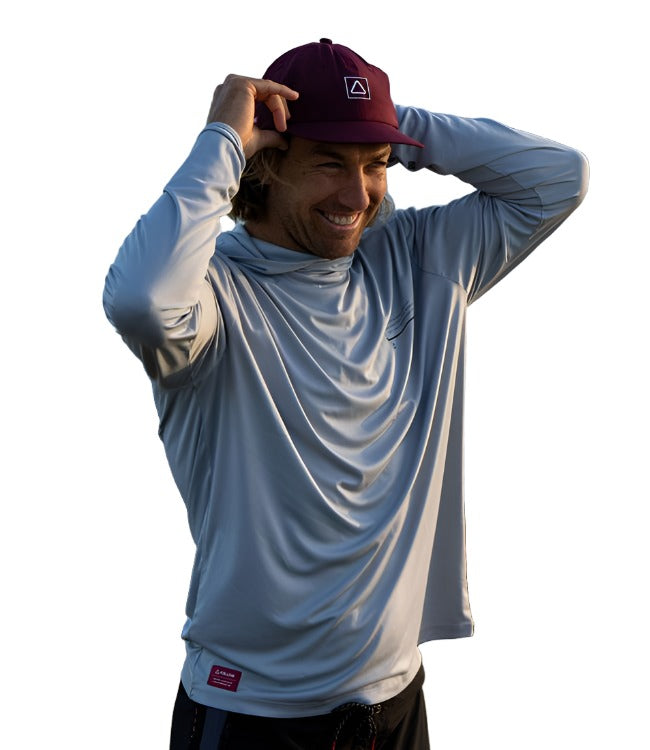 Follow Sun Hood Long Sleeve Light Grey Mens - angled view of the hooded sun top on the water