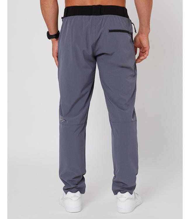 Follow Tech Pant Alloy Mens - detail of the waistband drawcord and seam construction