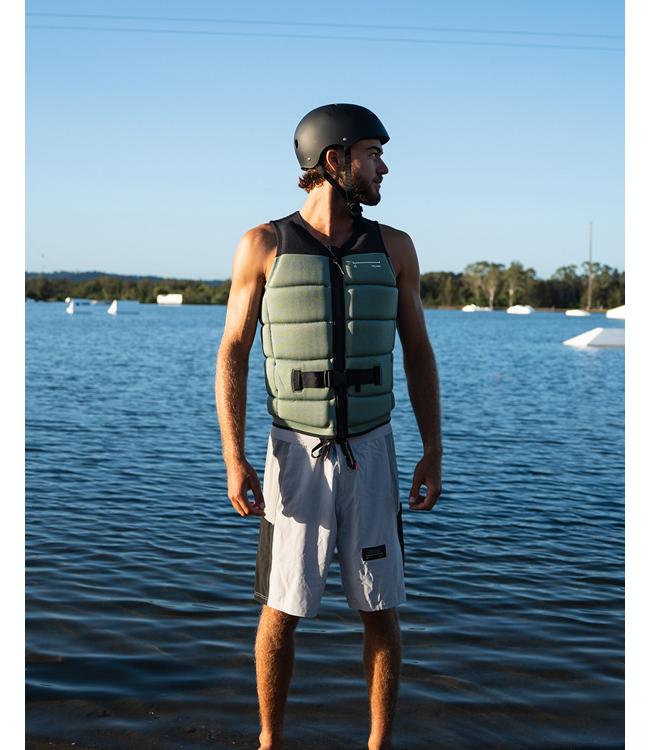 Follow Section Black/Petina Mens Life Vest on a rider carving across the wake on open water