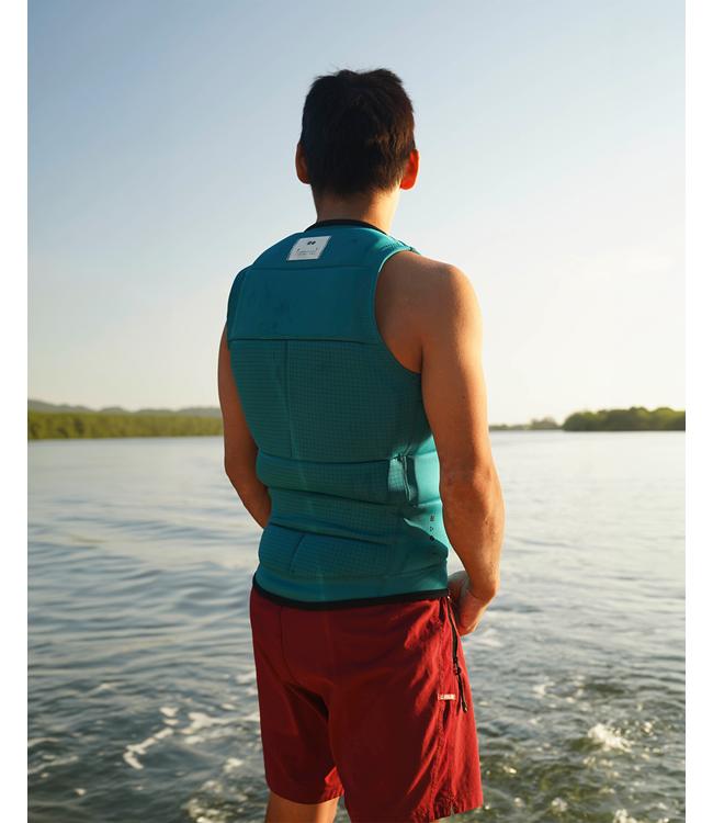 Follow P1 Traction Emerald Mens Life Vest on a wakeboarder riding the wake at speed on flat water