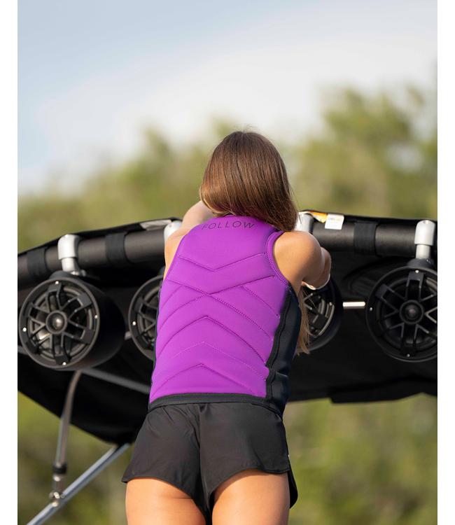 Follow Cleo Grape Womens Life Vest on a rider carving across the wake on flat water