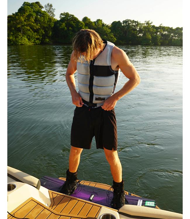 Follow Affix Silver Mens Life Vest on a rider riding behind the boat at speed on open water