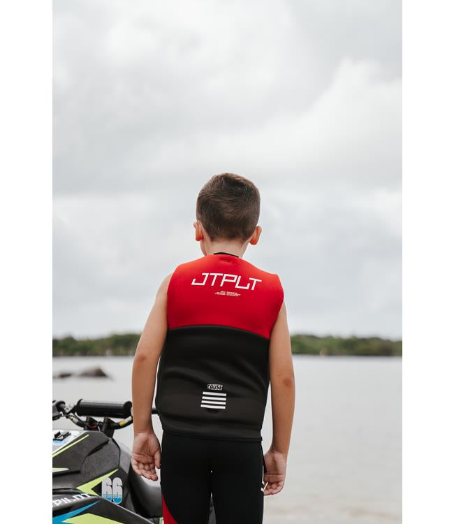 Jetpilot Cause Red Youth Life Vest lifestyle shot of child on water showing PFD 2 buoyancy