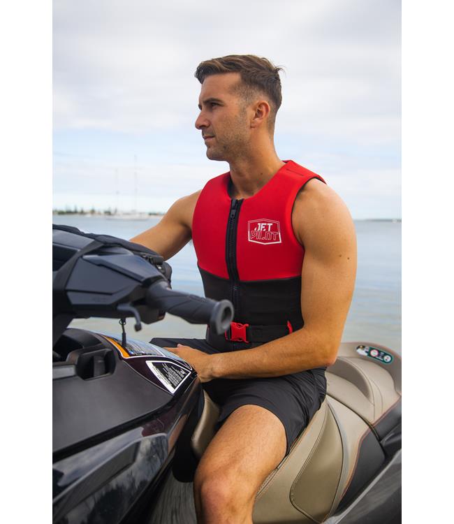 Jetpilot Cause Red Mens Life Vest lifestyle shot of rider on water showing buoyancy and freedom