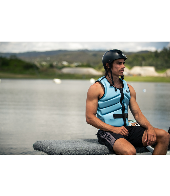 Jetpilot Freeride Steel Blue Mens Life Vest rider showing vest fit during wakeboard transition