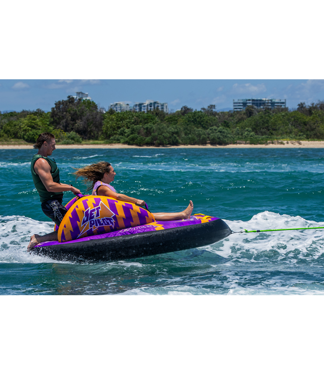 Jetpilot Chaser Single Rider Ski Tube on-water action shot showing tube speed and spray