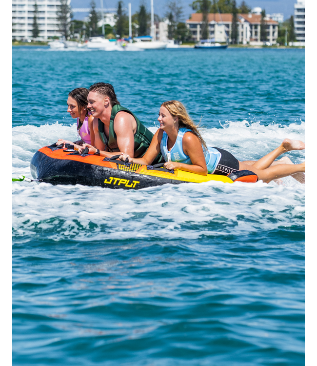 Jetpilot Speedster 3 Person Ski Tube riders sitting on tube ready for tow start on water