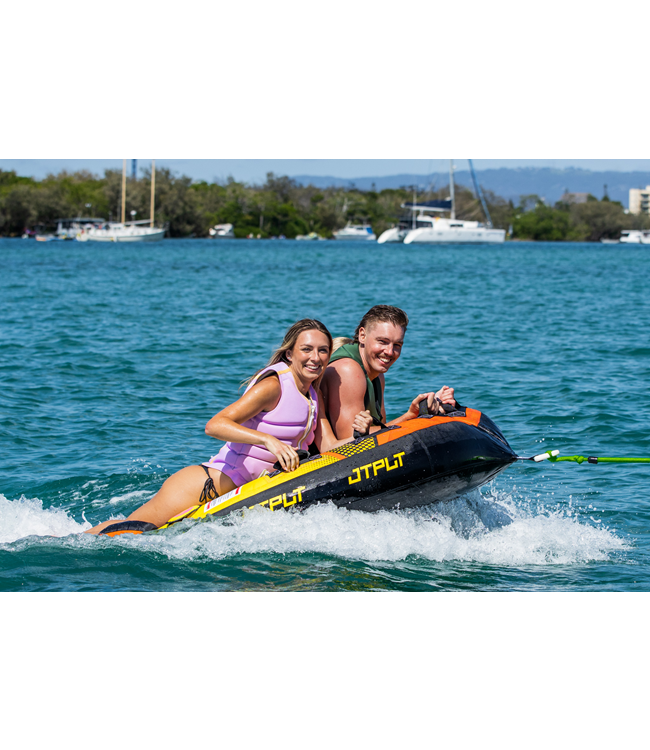 Jetpilot Speedster 3 Person Ski Tube on-water action shot showing three riders being towed