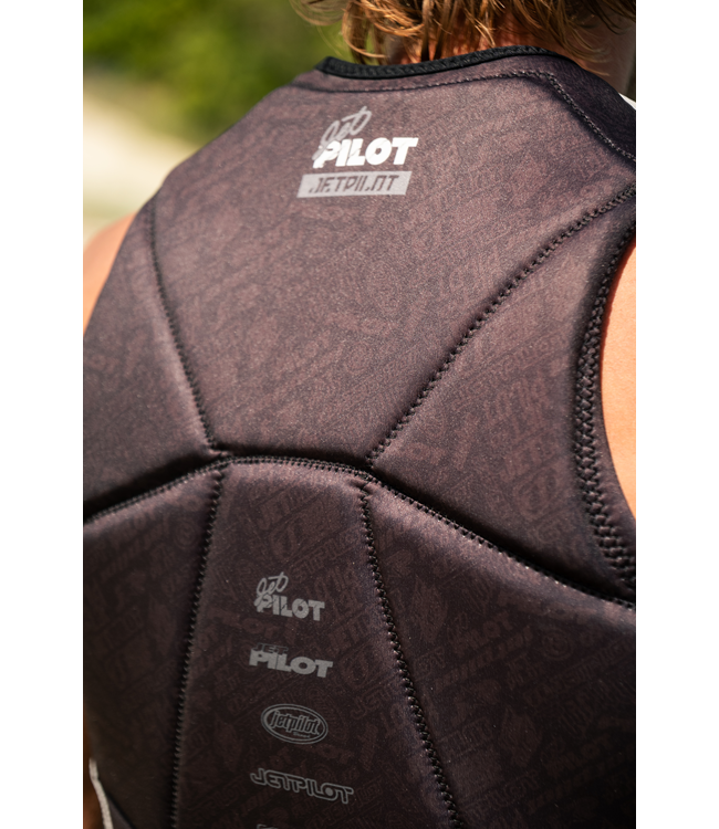 Jetpilot Nighthawk Black Mens Life Vest worn by rider showing trim athletic wakeboarding fit