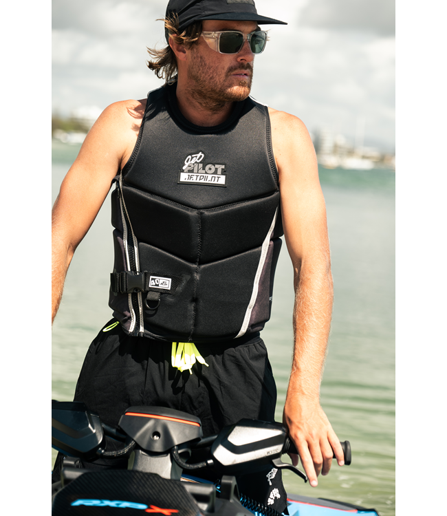 Jetpilot Nighthawk Black Mens Life Vest in-action shot during wakeboard ride showing flex