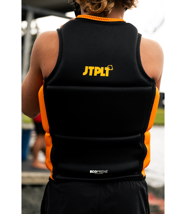 Jetpilot Freeride Black Boys Life Vest worn lifestyle shot of young rider near water