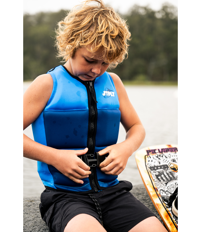 Jetpilot Freeride Blue Boys Life Vest worn by boy showing fit through chest and shoulders