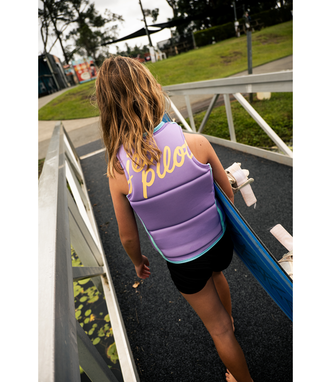 Jetpilot Freeride Purple Girls Life Vest on-water action shot of girl wakeboarding