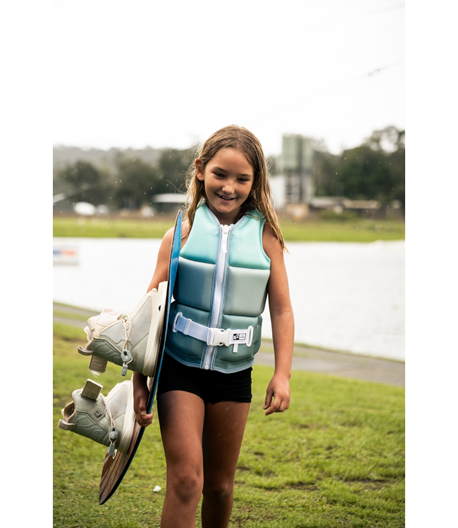 Jetpilot Freeride Teal Girls Life Vest on-water action shot of girl wakeboarding