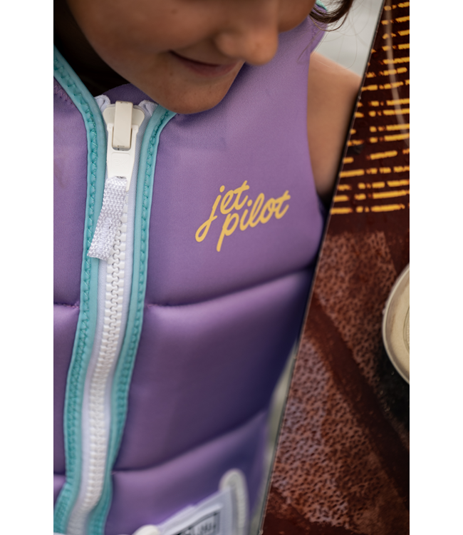 Jetpilot Freeride Purple Girls Life Vest young female rider portrait showing torso vest fit