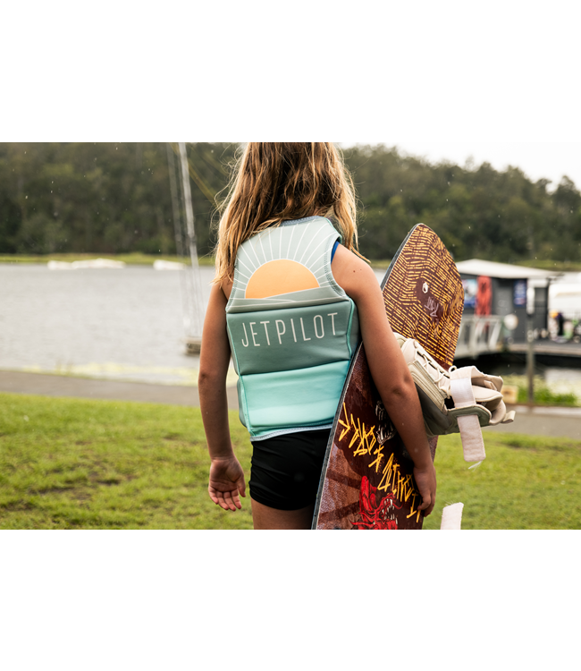 Jetpilot Freeride Teal Girls Life Vest worn close shot showing fit through chest panel