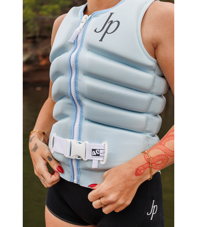 Jetpilot Zahra X1 Ice Blue Womens Life Vest worn lifestyle shot of female rider on dock