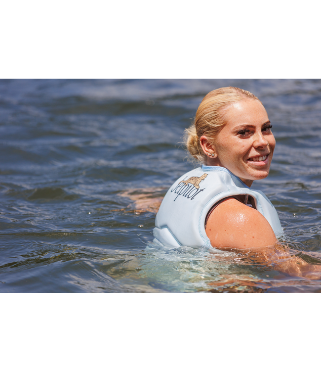 Jetpilot Zahra X1 Ice Blue Womens Life Vest mid wakeboard action shot with full body shown