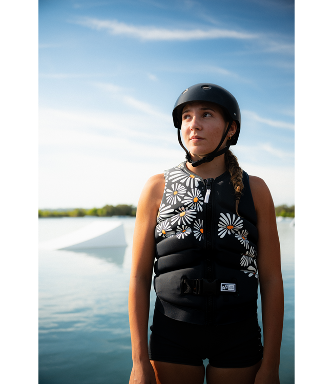Jetpilot Isla X1 Charcoal Womens Life Vest on-water wakeboard action showing panel flex
