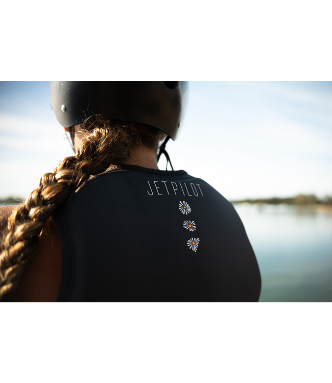 Jetpilot Isla X1 Charcoal Womens Life Vest lifestyle rider portrait near water at sunset