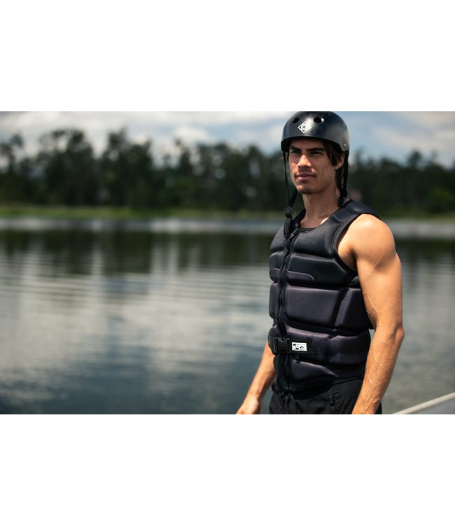 Jetpilot C4 Black Mens Life Vest worn rider lifestyle shot showing wakeboard vest fit