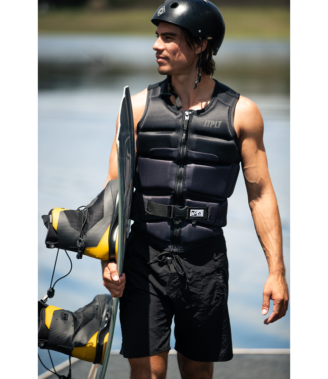Jetpilot C4 Black Mens Life Vest worn alternate angle showing trim wakeboarding profile