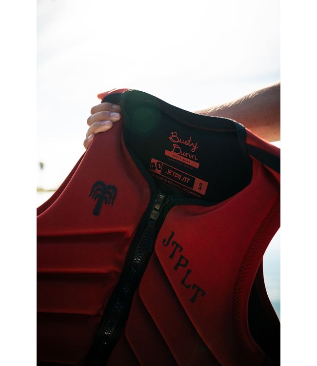 Jetpilot Busty X1 Dark Red Mens Life Vest Sunn signature rider portrait on the water
