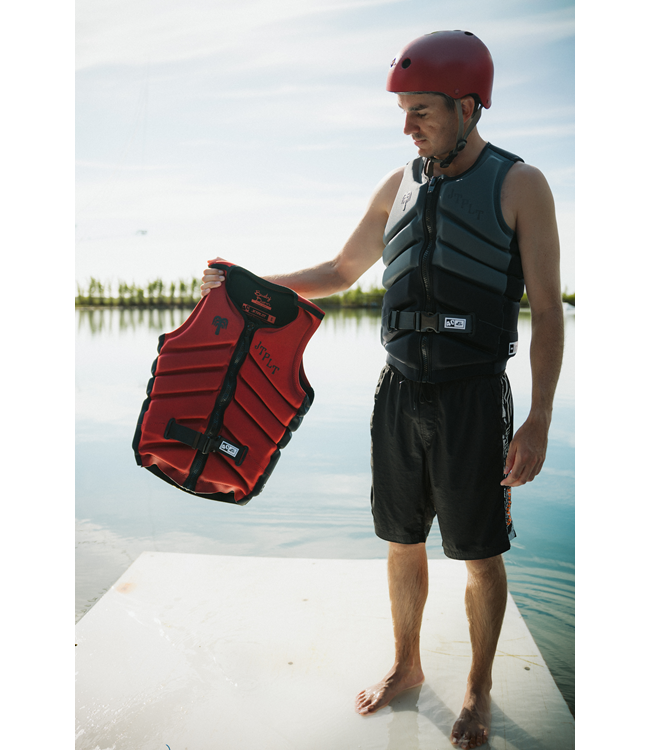Jetpilot Busty X1 Black Mens Life Vest Sunn signature series boat dock portrait of rider