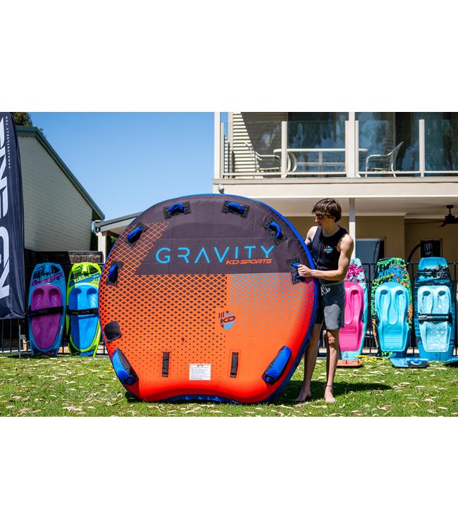KD Gravity 3 3-person soft-top ski tube - studio angle showing six soft-grip handles across deck