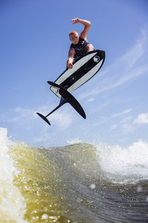 Liquid Force X Foil Board on a rider carving a turn while wakefoiling
