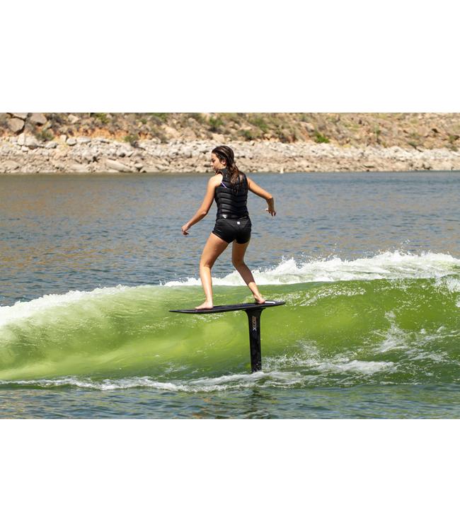 Ronix Carbon Speed Foil Complete - rider foiling along the face of a clean green wave