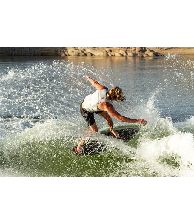 Ronix Carbon Air Core 4 Skimmer - rider carving hard through the trough with spray off the rail