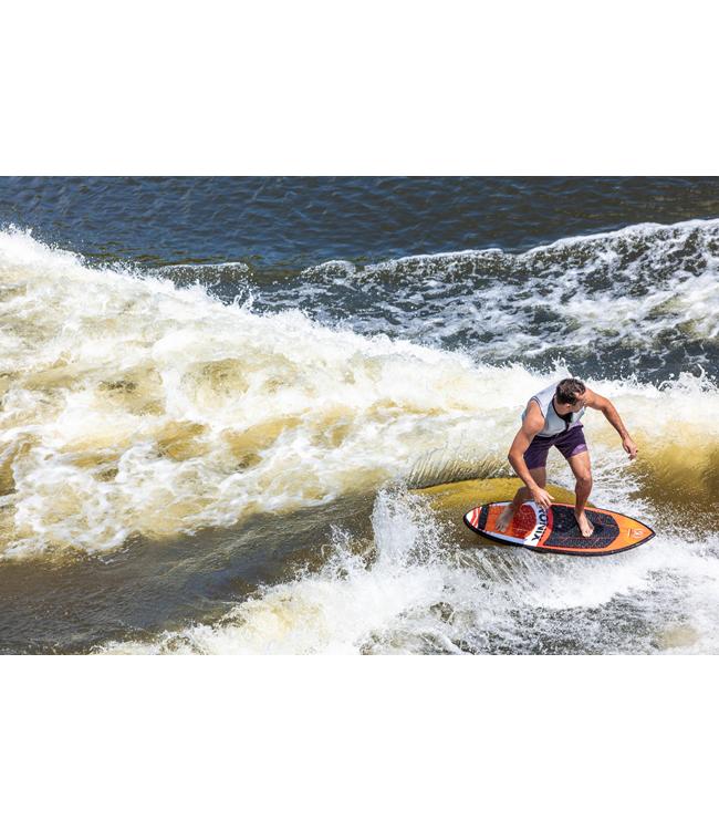 Ronix South Shore Skimmer - rider surfing a churned brown-water wake on the red board