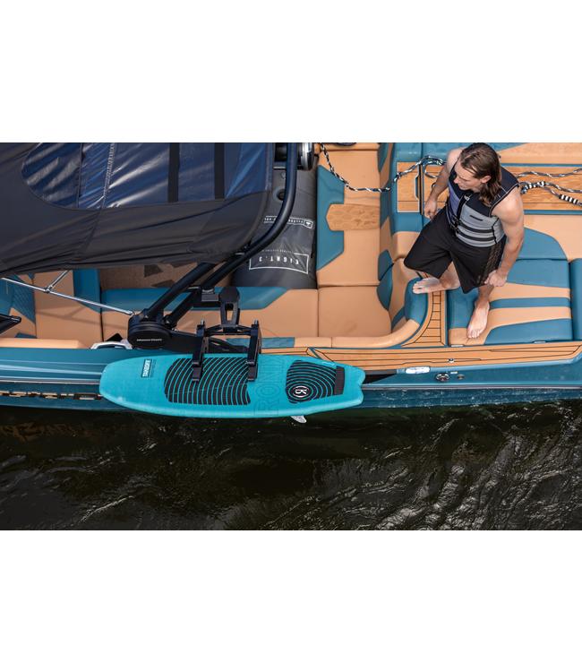 Ronix Takeoff Marsh Mellow Wakesurfer - rider crouched on the boat platform with the teal board