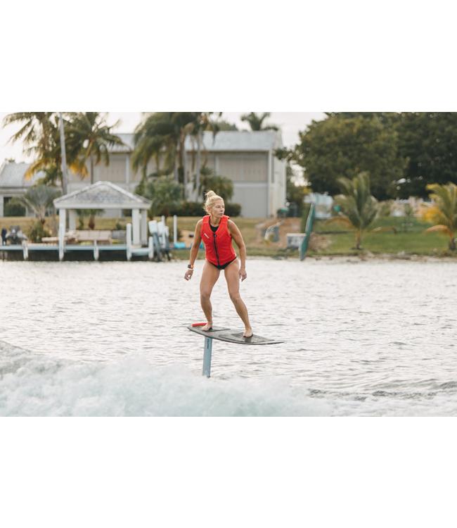Ronix Balance Foil Complete - rider foiling on flat water past a palm-lined shoreline