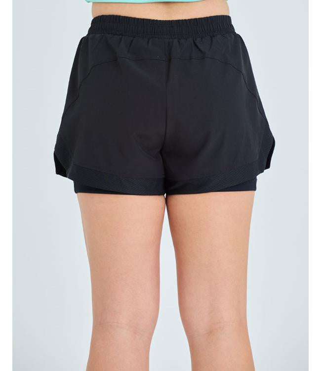 Jetpilot Corp Black Womens Elastic Waist Rideshorts lifestyle shot worn by woman on jet ski