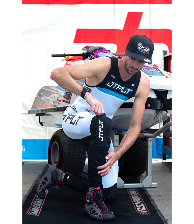 Jetpilot RX Vault Protech Black/Blue Mens Race John Wetsuit worn rider lifestyle shot on PWC