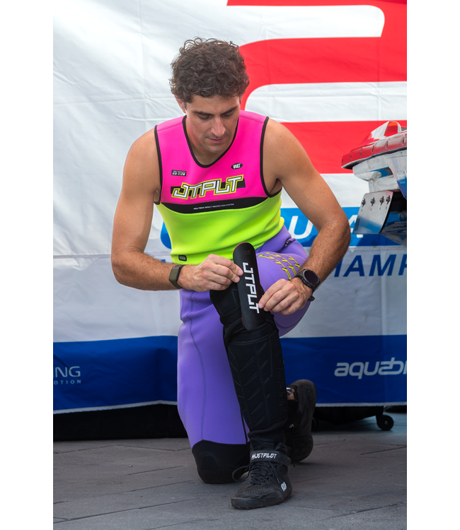 Jetpilot RX Vault Protech Pink/Yellow Mens Race John Wetsuit worn rider lifestyle shot on PWC