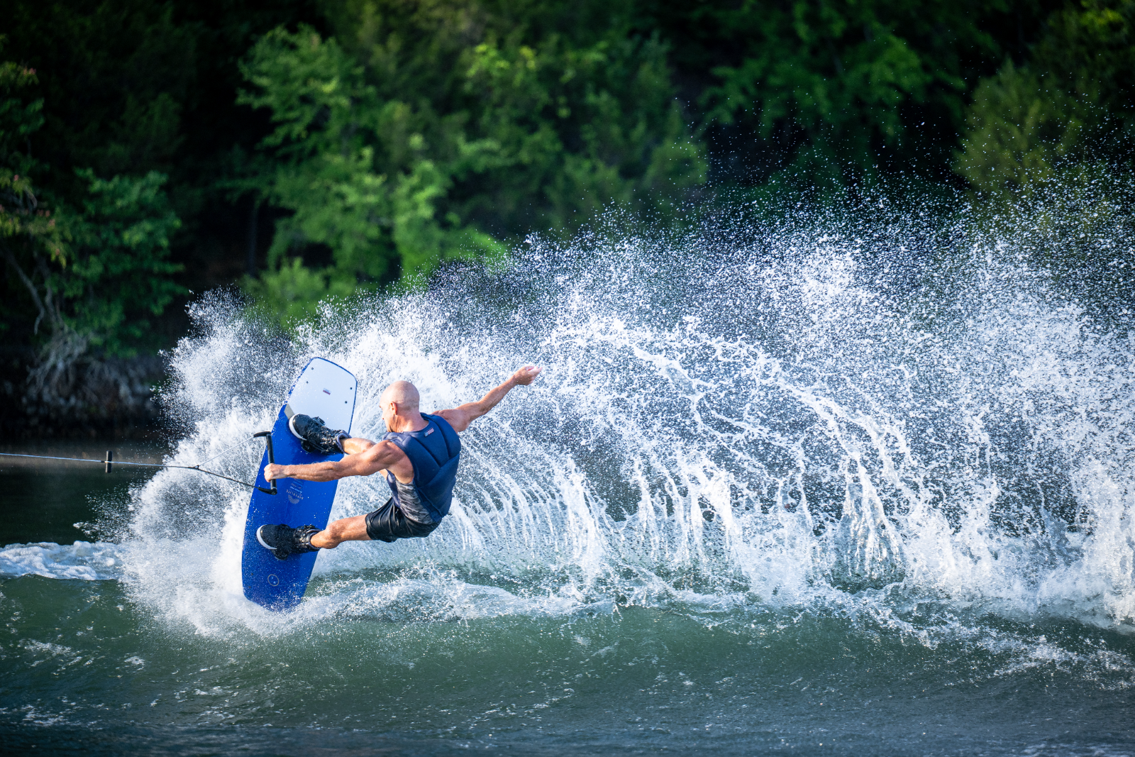 Wakeboarder carving through Queensland water