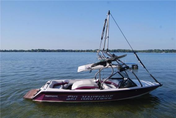 Fly High Pro X Tower Extension lifestyle view of the extension mounted to a boat tower behind the boat